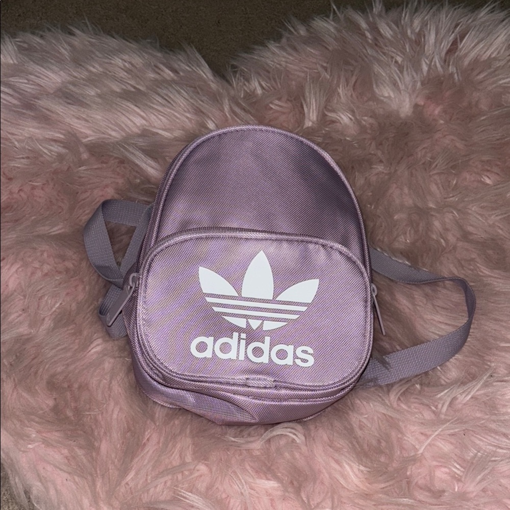 Adidas Women's lavender Mini Backpack
NWOT’s